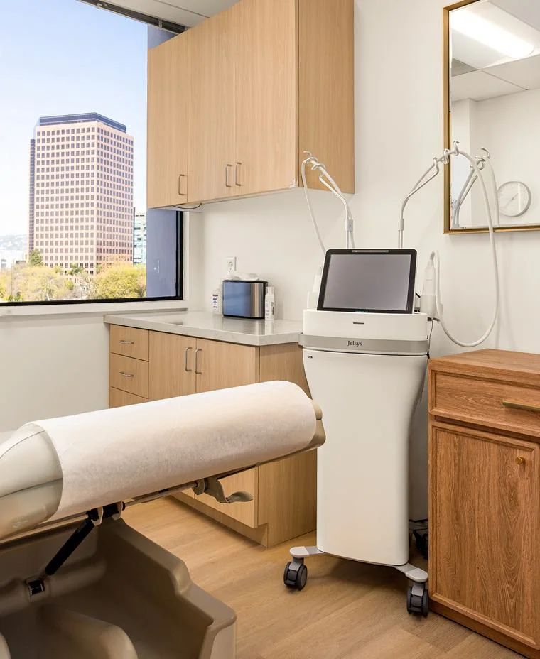The Potenza RF microneedling system by Jeisys beside the treatment chair at Yunella Wellness and Aesthetics, 6330 San Vicente Blvd, Los Angeles